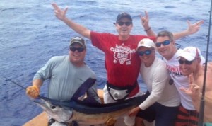 Louisville Cardinal head men's hoop coach Rick Pitino celebrates his new Maker's mark label by going out and catching an 80-pound marlin in the Bahamas.