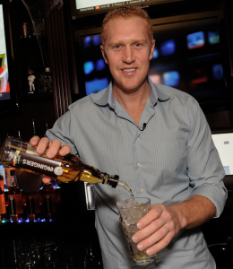 The White Mamba - aka former NBA player Brian Scalabrine - pours three to four fingers of 2 Gingers Irish whiskey at the Boston launch party.