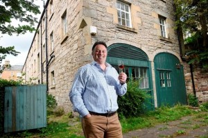 David Robertson standing in front of the Engine Shed building in Edinburgh that is destined to become the Holyrood Distillery in 2016.